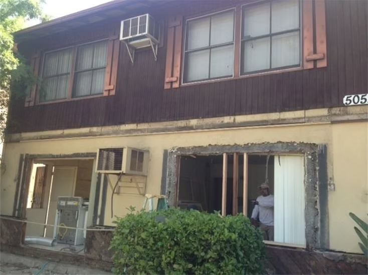 Kester Ave. stucco — before